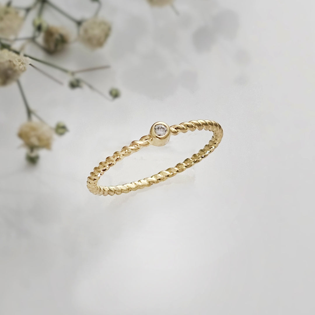 Minimal Twisted Gold-Plated Silver Ring with Diamond