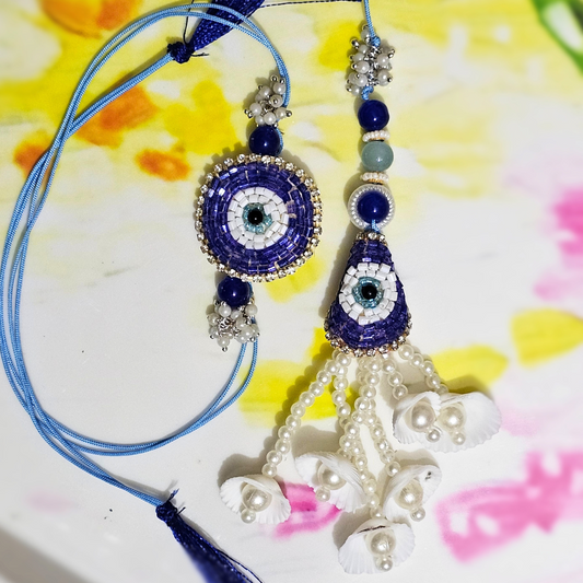 Evil Eye Couple Rakhi in a contemporary style