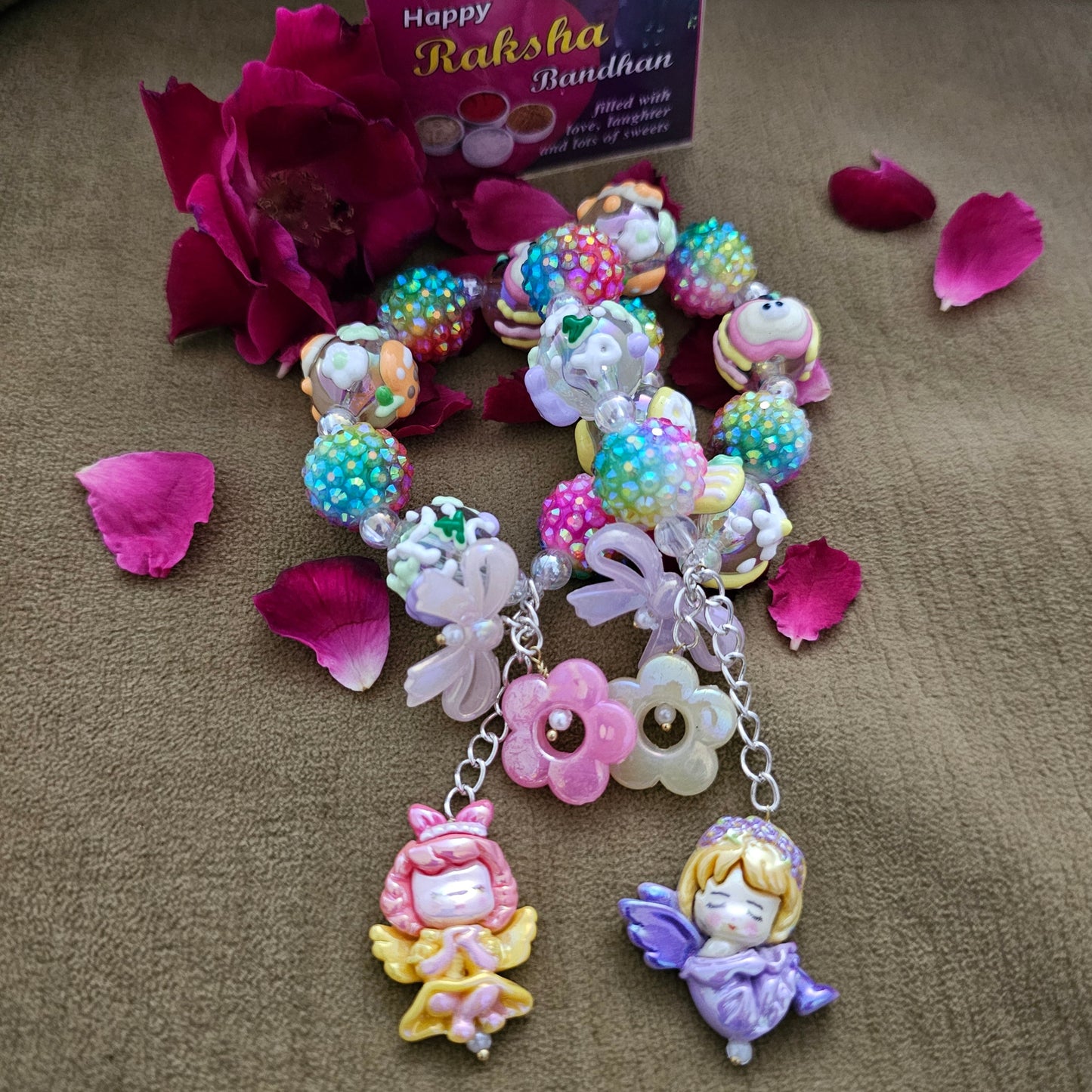Bracelet with Blinging Balls and Dolls Rakhi for Cute Girls