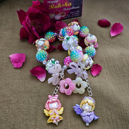 Bracelet with Blinging Balls and Dolls Rakhi for Cute Girls