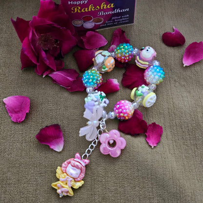 Bracelet with Blinging Balls and Dolls Rakhi for Cute Girls