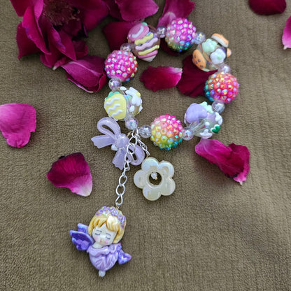Bracelet with Blinging Balls and Dolls Rakhi for Cute Girls