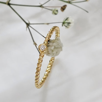 Minimal Twisted Gold-Plated Silver Ring with Diamond