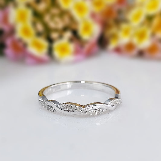 Silver ring with small diamonds 