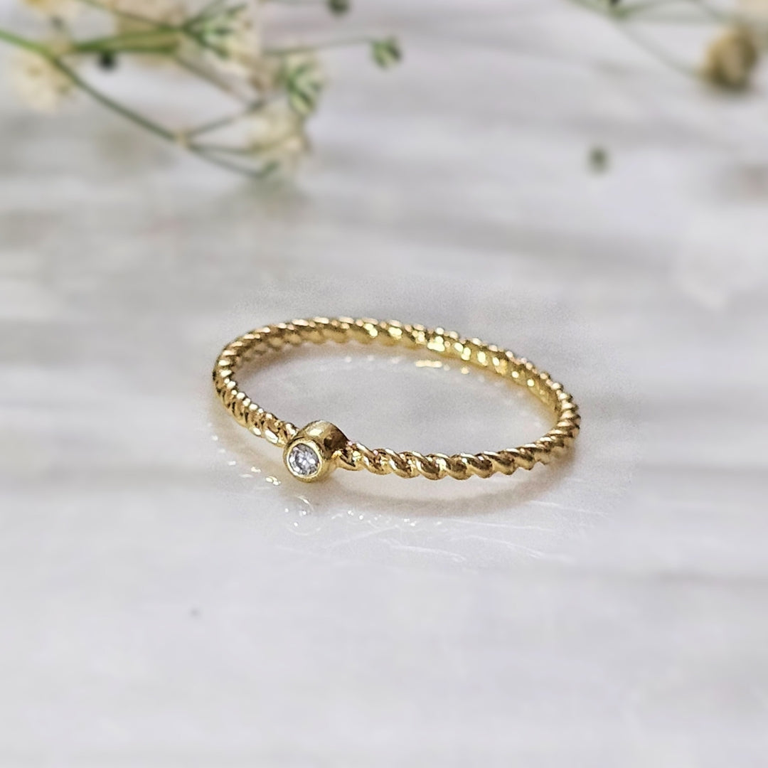 Minimal Twisted Gold-Plated Silver Ring with Diamond