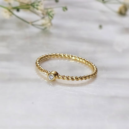 Minimal Twisted Gold-Plated Silver Ring with Diamond